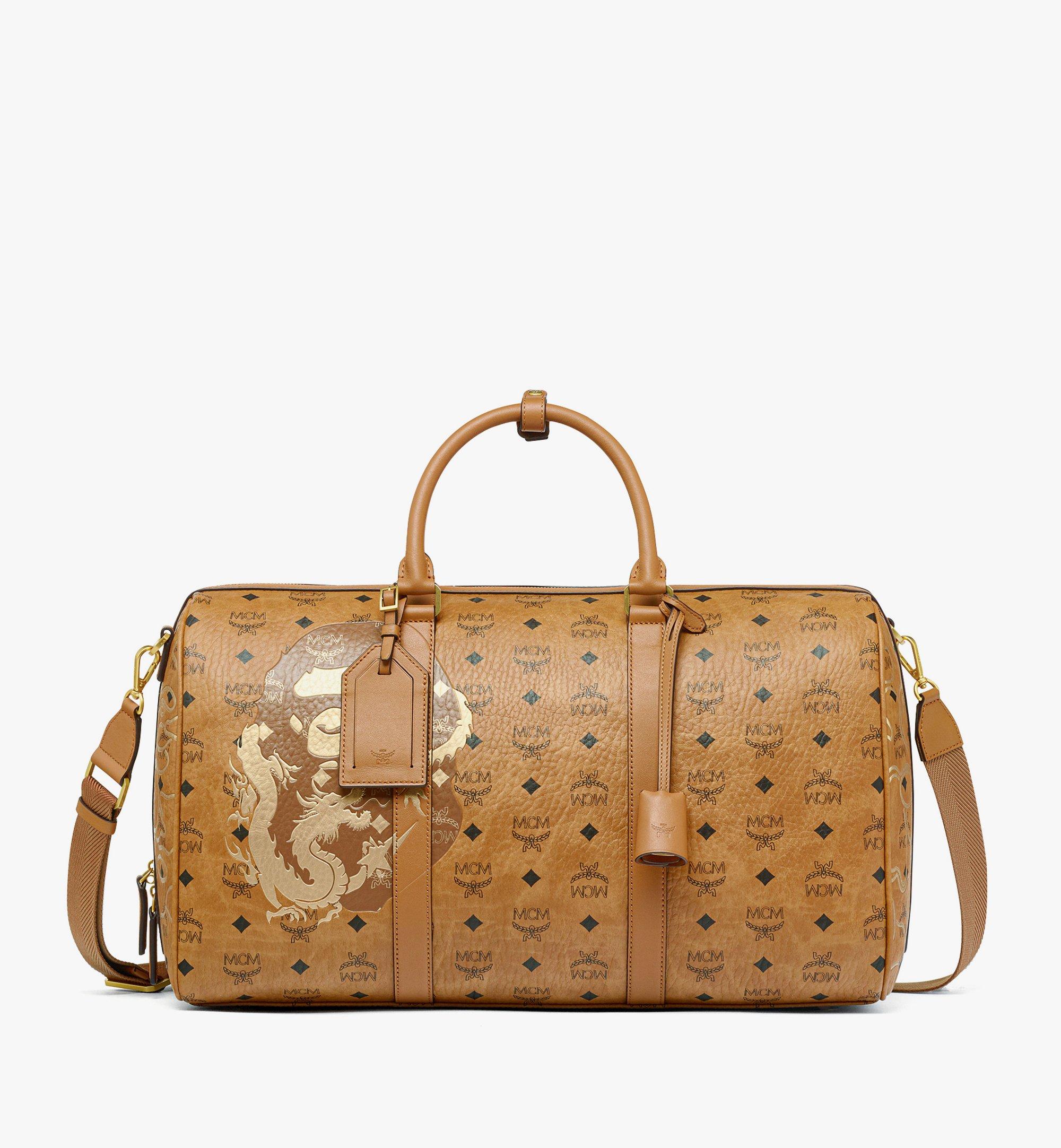 Pink mcm hot sale duffle bag